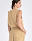 Elegant back silhouette of the Valencia Blouse in Camel.