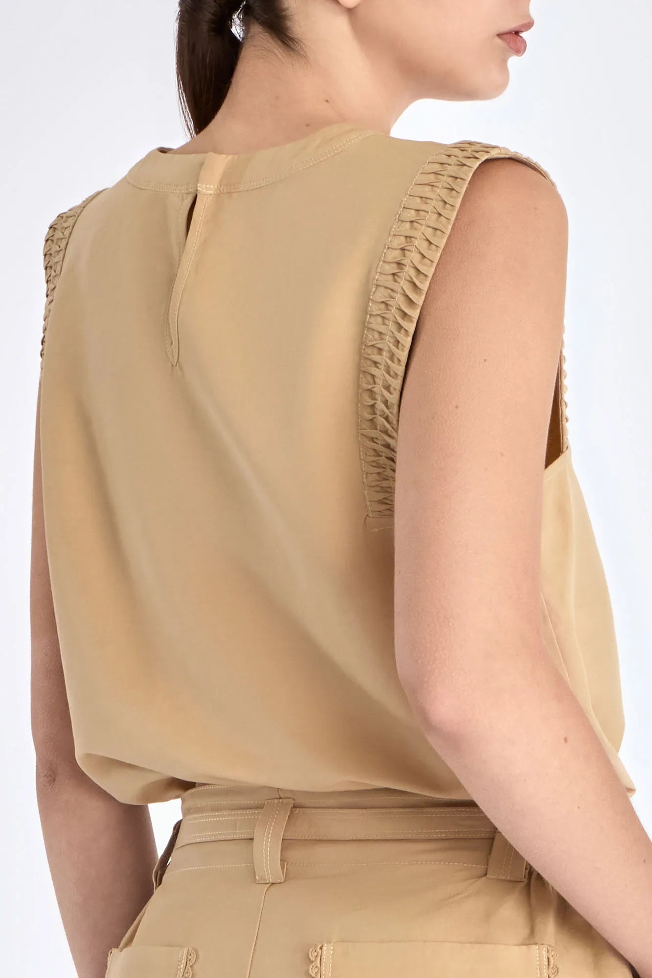 Elegant back silhouette of the Valencia Blouse in Camel.