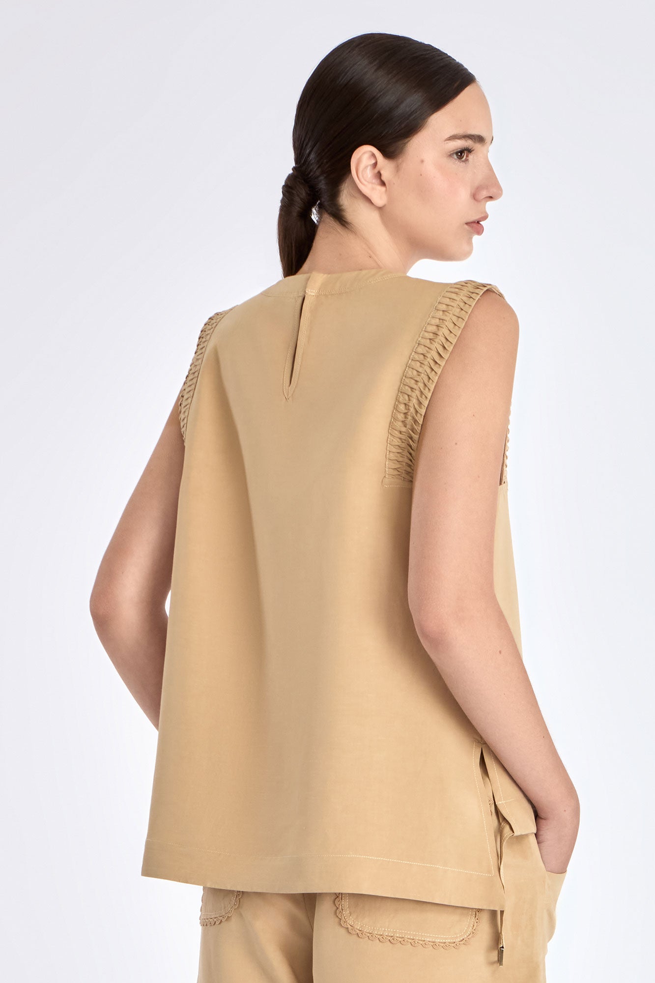 Elegant back silhouette of the Valencia Blouse in Camel.