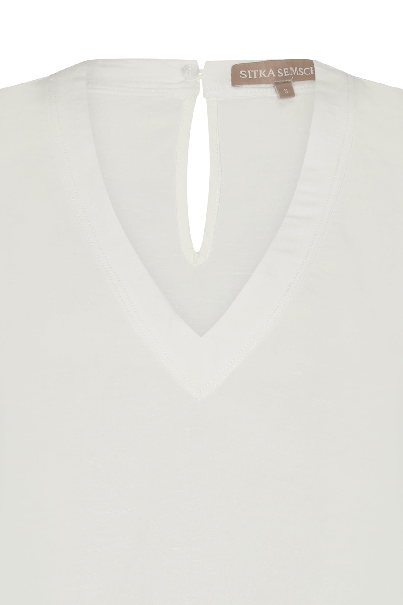 Valencia Blouse in Off White with modern drawstring and metal buckle accents