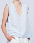 Valencia Blouse in Sky Blue with drawstring and metal buckle hem