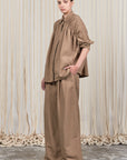 Veda Pant in Taupe, sophisticated wide-leg pants with minimalist design and functional details.