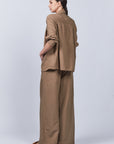 Veda Pant in Taupe, sophisticated wide-leg pants with minimalist design and functional details.