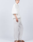 Zayla Jacket in Off White, refined elegance with front patch pockets and button closure.