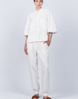 Zayla Pant in Off White, casual-chic joggers with a relaxed fit and adjustable drawstrings.