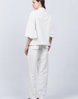 Zayla Pant in Off White, casual-chic joggers with a relaxed fit and adjustable drawstrings.