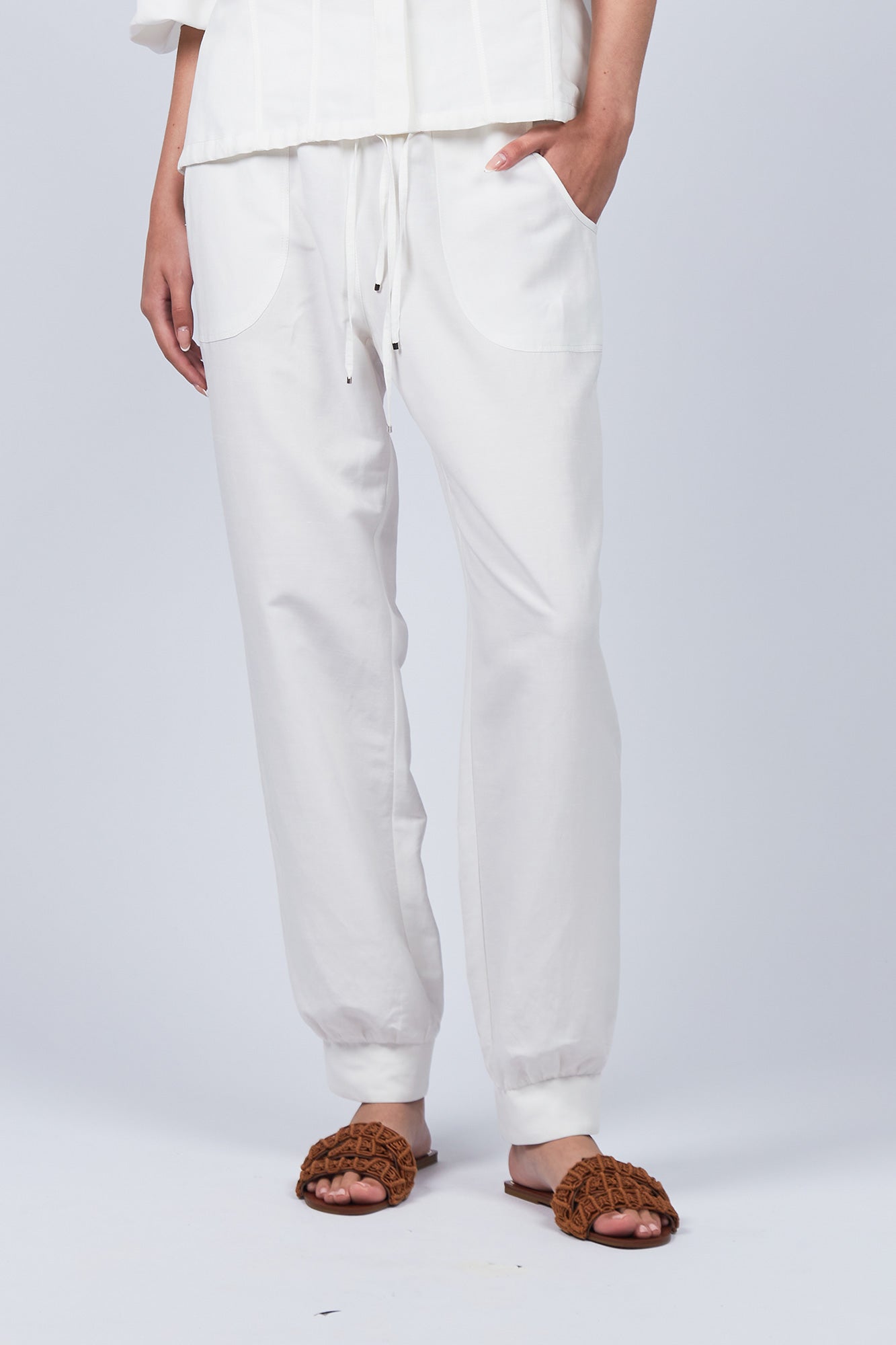 Zayla Pant in Off White, casual-chic joggers with a relaxed fit and adjustable drawstrings.