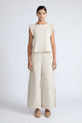 Zoe Pant in Prestine – High-waisted wide-leg pants in 100% cotton with patch pockets and side vents.