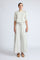 Zoila Pant in Silver – High-waisted cotton palazzo pants with metal buckle belt, back patch pockets, and contrast stitching.